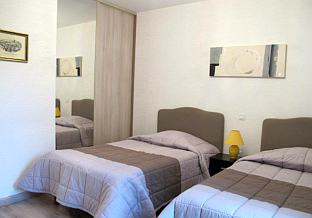 A twin bedroom at the School